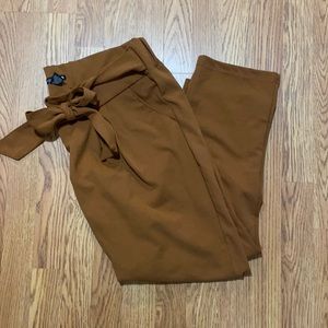 Tan paper bag pants with belt